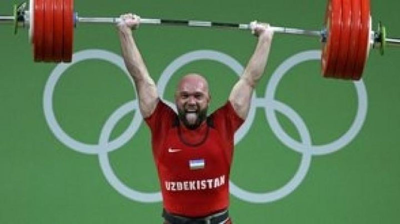 Изрображение 'РУСЛАН НУРУДИНОВ ЗАВОЕВАЛ ЗОЛОТО, УСТАНОВИВ ОЛИМПИЙСКИЙ РЕКОРД'