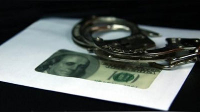 'Buxoro shahar hokimligi vakili pora olayotgan vaqtda ushlandi'ning rasmi