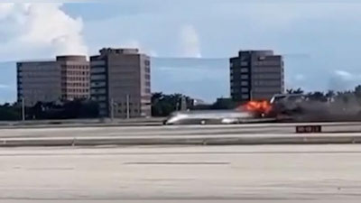 Изрображение 'В США самолет загорелся во время аварийной посадки: драматичные кадры'