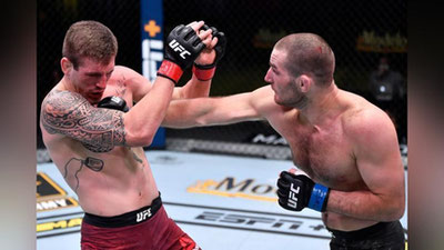 'UFC turniri natijalari ma`lum qilindi: G`oliblarga gonorarlardan tashqari 50 000 AQSh dollaridan taqdim etiladi'ning rasmi