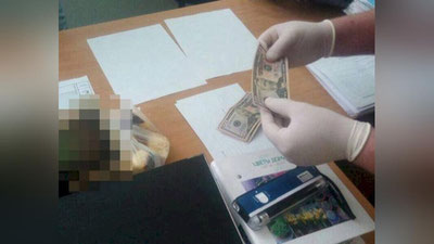 'Universitet dosenti 4 000 AQSh dollar pora bilan qo`lga olindi'ning rasmi