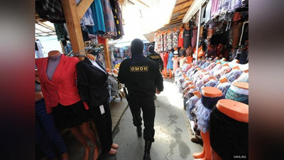 'Putin migrantlar faoliyati bilan bog`liq qonunni imzoladi'ning rasmi