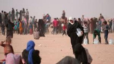 '​Iroqning Mosul shahri aholisi och-nahor yashamoqda'ning rasmi