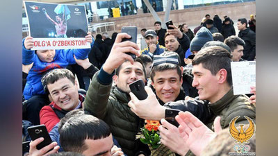 'Maykl Foksni mag`lub etgan Shohjahon Ergashev O`zbekistonda tantanali kutib olindi'ning rasmi