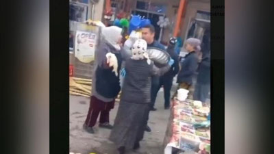 'Surxondaryoda bozorchi ayol soliqchi bilan janjallashdi (video)'ning rasmi