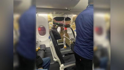 Изрображение 'Самолет потерял часть фюзеляжа вместе с иллюминатором во время рейса в США (видео)'