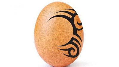 'Tatiurovkali tuxum Mayk Taysonni jig`ibiyron qilmoqda 'ning rasmi