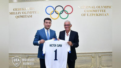 'Umid Ahmadjonov Ektor Kuper bilan uchrashdi'ning rasmi
