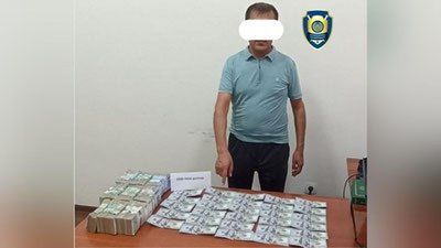 'Тўрткўлда валюта олди-сотдиси билан шуғулланиб келган фуқаро ушланди'ning rasmi