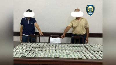 'Тўрақўрғон туманида қалбаки 14 200 АҚШ долларини муомалага киритган шахслар қўлга олинди'ning rasmi