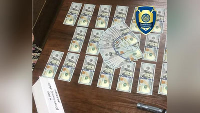 'Xorij fuqarosiga 12 ming AQSh dollari evaziga O`zbekistonga kirish vizasini olib berishni va`da qilgan shaxslar ushlandi'ning rasmi