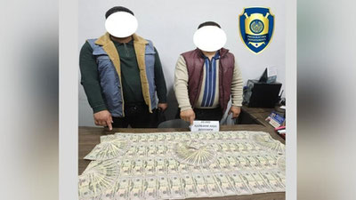 'Chilonzorda qalbaki 20 000 AQSh dollarlarini teng yarmiga sotayotganlar qo`lga tushdi'ning rasmi