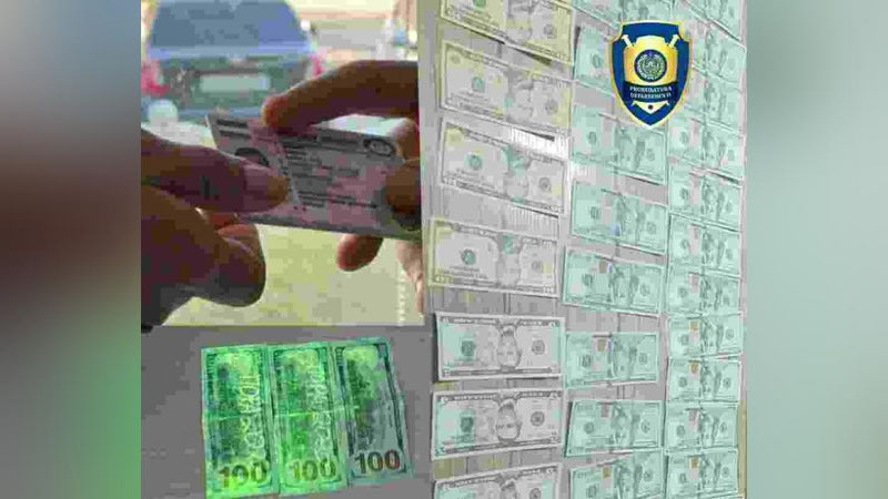 '2 hududda pora evaziga "prava" olib berishni va`da qilganlar ushlandi'ning rasmi