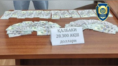 'Toshkentda qalbaki AQSh dollari sotayotganlar qo`lga olindi'ning rasmi