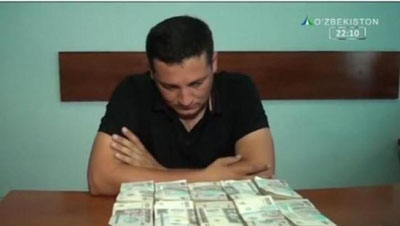 'Urganch tuman hokimining o`rinbosari 5 mln. so`m pora olayotganda qo`lga olindi (video)'ning rasmi