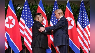 'Tramp Kim Chen In bilan uchrashdi'ning rasmi