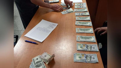 Изрображение 'В Астане авиапассажир пытался вывезти в Ташкент 21 тысячу долларов (видео)'