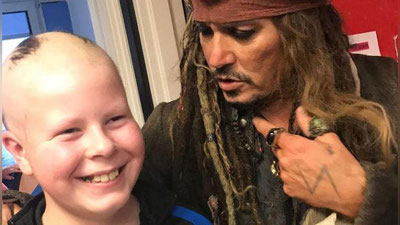 'Jek Chittak saratonga chalingan bemorlarni ko`rishga keldi 'ning rasmi