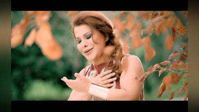 'YuLDUZ USMONOVA KONSTITUSIYa BAYRAMIGA BAG`IShLAB YaNGI QO`ShIQ KUYLADI'ning rasmi