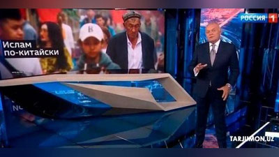 'Kiselyov va uning xodimlari musulmon-uyg`urlar uchun tuzilgan lagerlarni madh etishdi'ning rasmi