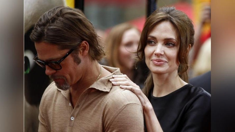 Изрображение 'Кто стал инициатором развода в звездной семье Анджелины Джоли и Брэда Питта?'