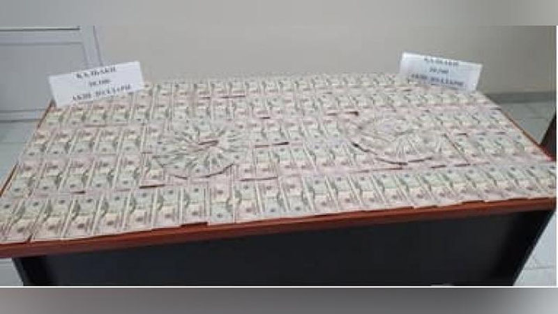 'Qalbaki dollarga Andijonda 9 ta iPhone olishmoqchi, Namanganda esa soxta dollarni bankka o`tkazmoqchi bo`lishdi'ning rasmi