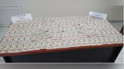 'Qalbaki dollarga Andijonda 9 ta iPhone olishmoqchi, Namanganda esa soxta dollarni bankka o`tkazmoqchi bo`lishdi'ning rasmi