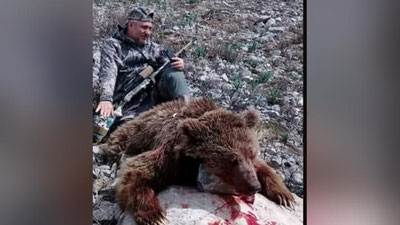 'Rossiyalik ovchi Ekologiya qo`mitasi raisining ruxsati bilan "Qizil kitob"ga kiritilgan ayiqni o`ldirdi'ning rasmi