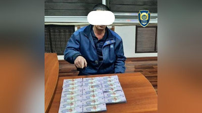 'Асака туманида қалбаки 100 млн сўм пулларни ўтказаётган фуқаролар ушланди'ning rasmi