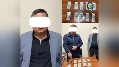 'Зангиота тумани ҳокими ёрдамчиси тадбиркордан катта миқдорда пора олаётганда қўлга тушди'ning rasmi