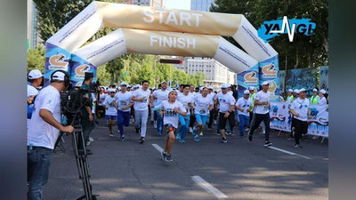 Изрображение 'Одновременно в восьми городах республики состоялся спортивный забег Yangi Nafas'