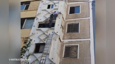 Изрображение 'На массиве Сергели спасатели сняли с пятого этажа повисшую девочку (видео)'