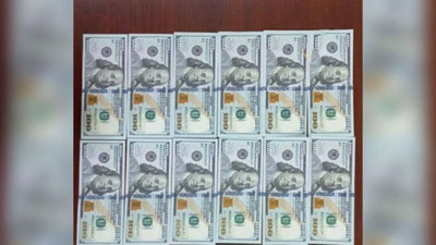 Изрображение 'В Ташкенте покупательница iPhone 13 расплатилась фальшивыми долларами'