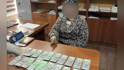 'Farg`onada 7 ming dollar evaziga ichki ishlarga ishga kiritib qo`yishni va`da qilgan ayol ushlandi'ning rasmi