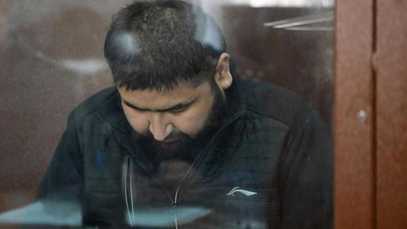 'U Krokusdagi terakt ishida sakkizinchi ayblanuvchiga aylandi'ning rasmi