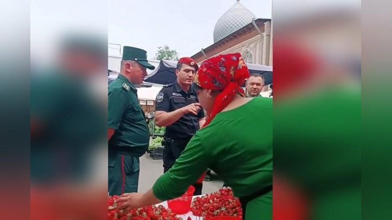 'Toshkentda Milliy gvardiya xodimlari bozorda qulupnay sotuvchilar bilan janjallashdi'ning rasmi