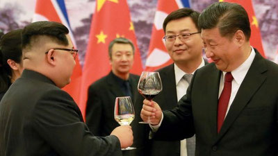 'Kim Chen In Xitoy bilan munosabatlarini mustahkamlash niyatida'ning rasmi