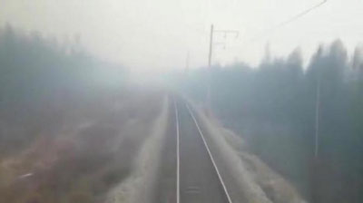 'Rossiyada poezd yonayotgan o`rmon ichra eldi (Video)'ning rasmi