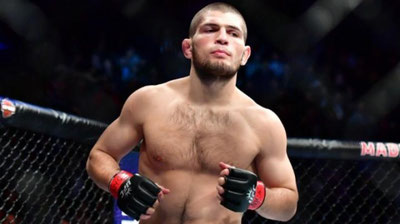 'Habib Nurmagomedovga "Dog`iston xalq qahramoni" unvoni va "Oltin burgut" nishoni beriladi​'ning rasmi