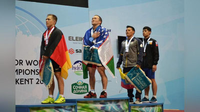 'Adhamjon Ergashev og`ir atletika bo`yicha jahon chempioni!'ning rasmi