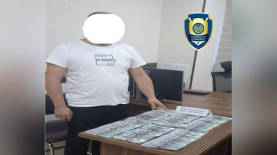 'Toshkent shahar iqtisodiy sudiga kiritgan da`vo arizasini qanoatlantirib berishni va`da qilgan firibgar 25 000 AQSh dollar bilan qo`lga tushdi'ning rasmi