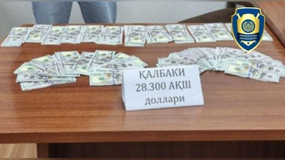 Изрображение 'В Ташкенте задержали группу лиц за продажу фальшивых долларов'