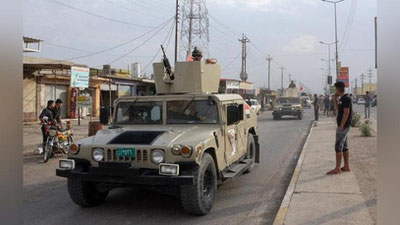 'Iroqning Mosul shahrida sodir etilgan portlash oqibatida odamlar qurbon bo`ldi 'ning rasmi