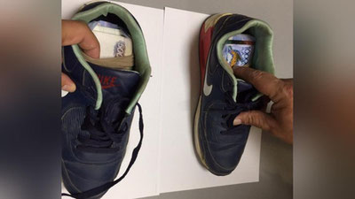 '​Sport oyoq kiyimi ichiga naqd xorijiy valyuta yashirilgan ekan'ning rasmi