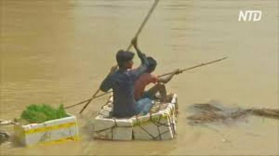 'Hindistonda to`g`on buzilishi oqibatida qishloq vayron bo`ldi'ning rasmi