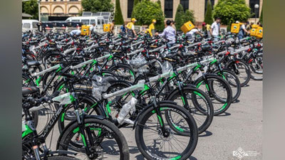 Изрображение 'Торгово-промышленная палата передала в Ташкенте 200 велосипедов курьерам доставки еды'