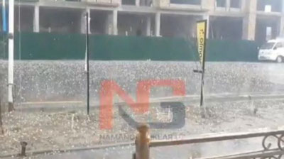 Изрображение 'Видео: град в Наманганской области в разгар июля'