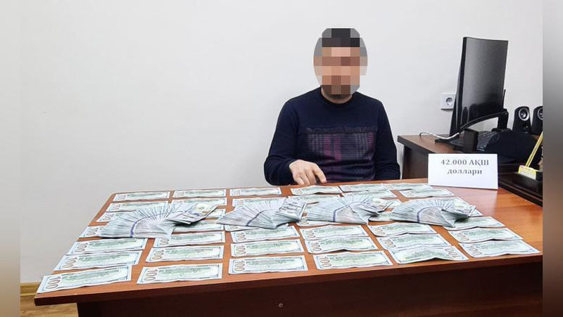 'Toshkent shahar hokimligi huzuridagi «Munisipal aktivlarni boshqarish markazi» xodimi 42 ming dollar olayotgan vaqtda qo`lga olindi'ning rasmi