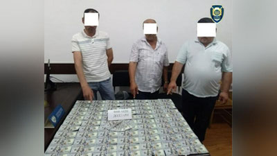 'Andijonda chet el valyutasini noqonuniy ravishda sotgan fuqarolar qo`lga olindi'ning rasmi