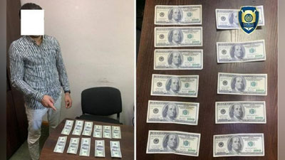 'Nurafshon shahrida qalbaqi dollar sotayotganlar qo`lga olindi'ning rasmi